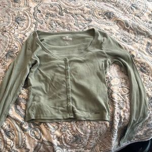 It’s a green crop top from Hollister